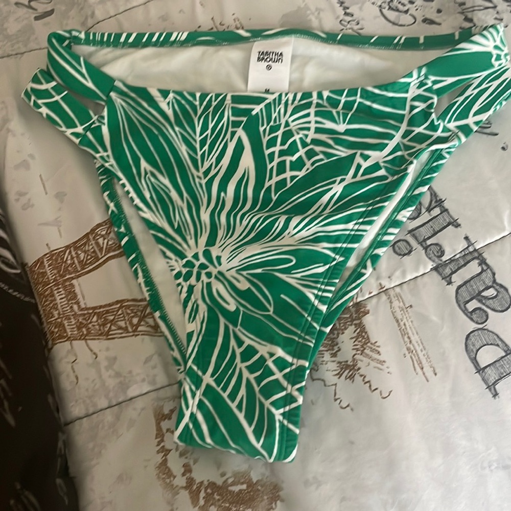 Green and white bikini bottoms .. never worn but no tag , lining still in tact